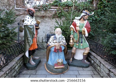 ST. WOLFGANG, AUSTRIA - DECEMBER 14: Biblical Magi or Three Wise Men infront the church in St. Wolfgang on Wolfgangsee in Austria on December 14, 2014.