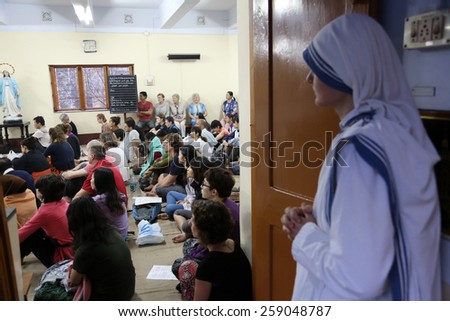 KOLKATA, INDIA - FEBRUARY 15: Sisters of Mother Teresa\'s Missionaries of Charity and volunteers from around the world at the Mass in the chapel of the Mother House, Kolkata, India at February 15, 2014