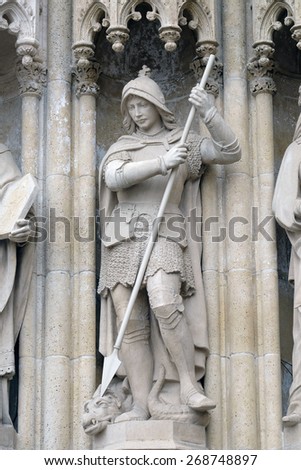 ZAGREB, CROATIA - APRIL 04: Statue of Saint George on the portal of the cathedral dedicated to the Assumption of Mary and to kings Saint Stephen and Saint Ladislaus in Zagreb on April 04, 2015