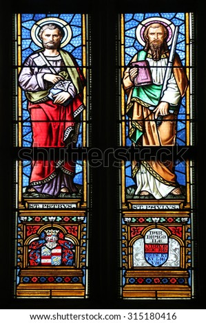 ZAGREB, CROATIA - NOVEMBER 21: Saint Peter and Paul, stained glass window in parish church of Saint Mark in Zagreb, Croatia on November 21, 2014