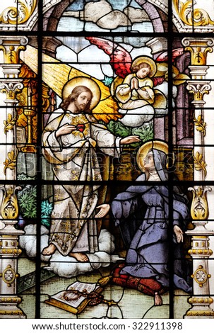 ZAGREB, CROATIA - MAY 28: Jesus and Saint Margaret Mary Alacoque, stained glass window in the Basilica of the Sacred Heart of Jesus in Zagreb, Croatia on May 28, 2015