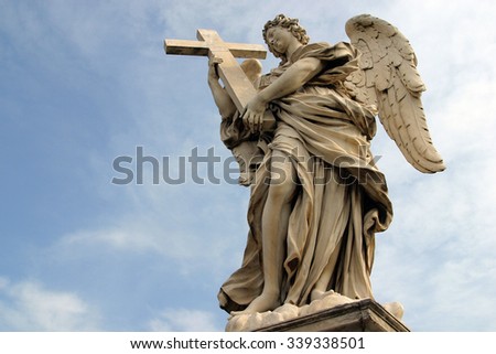 ROME, ITALY - FEBRUARY 27: Bernini\'s angel along the Holy Angel bridge near the Hadrian Mausoleum in Rome, Italy on February 27, 2010