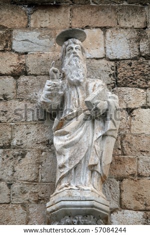 Statue of God the Father on the portal of the Franciscan church of the Friars Minor in Dubrovnik