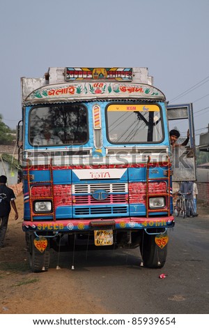 KUMROKHALI, INDIA - JANUARY 12: Typical, colorful, decorated public transportation bus in Kumrokhali, West Bengal, India, January 12, 2009.