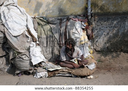 BARUIPUR,INDIA-JANUARY 13:Beggars are the most disadvantaged castes living in the streets,Baruipur,India on January 13, 2009. 42% of India falls below the international poverty line of $1.25 a day.