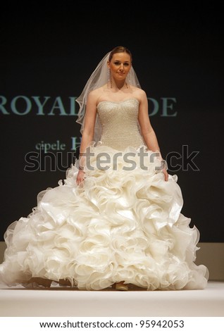 ZAGREB, CROATIA - FEBRUARY 19: Fashion model wears wedding dress made by Royal Bride on \'Wedding days\' show, February 19, 2012 in Zagreb, Croatia.