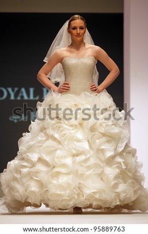 ZAGREB, CROATIA - FEBRUARY 19: Fashion model wears wedding dress made by Royal Bride on \'Wedding days\' show, February 19, 2012 in Zagreb, Croatia.