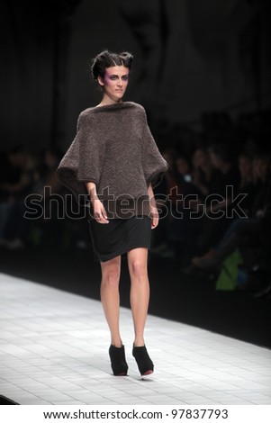 ZAGREB, CROATIA - MARCH 16: Fashion model wears clothes made by Arena by Galas on \