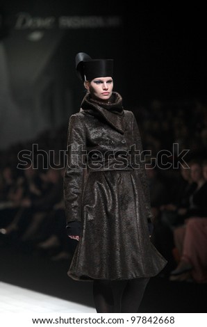 ZAGREB, CROATIA - MARCH 17: Fashion model wears clothes made by Branka Donassy on \