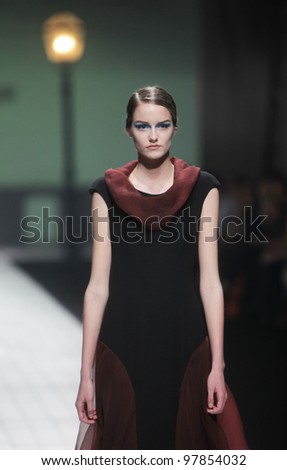 ZAGREB, CROATIA - MARCH 17: Fashion model wears clothes made by Branka Donassy on 