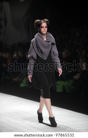 ZAGREB, CROATIA - MARCH 16: Fashion model wears clothes made by Arena by Galas on 