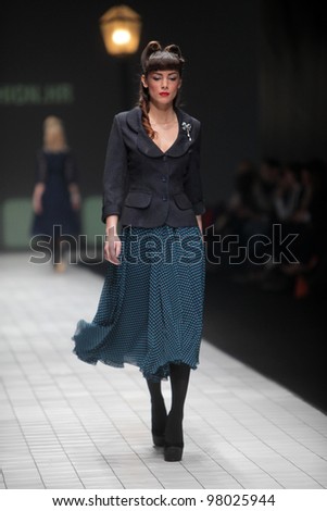 ZAGREB, CROATIA - MARCH 17: Fashion model wears clothes made by Ivica Skoko on \