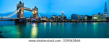 Panorama of Tower Bridge,Thames river, Shard hotel and City Hall at sunrise in London viewed from Tower of London. England
