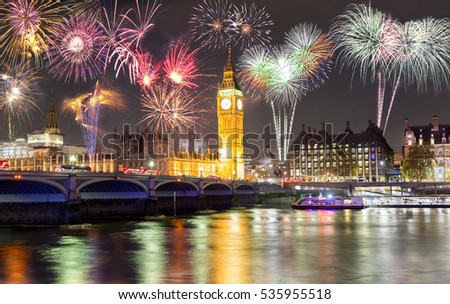 Big Ben and Westminster Bridge in London, United Kingdom, with fireworks
