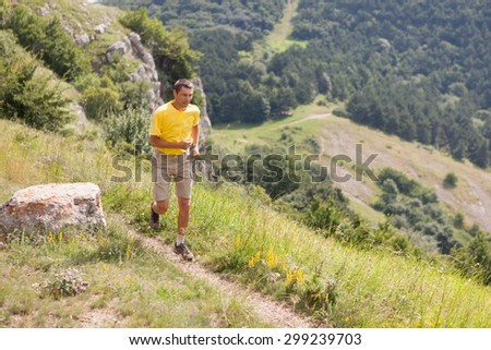 Man runs in the mountains