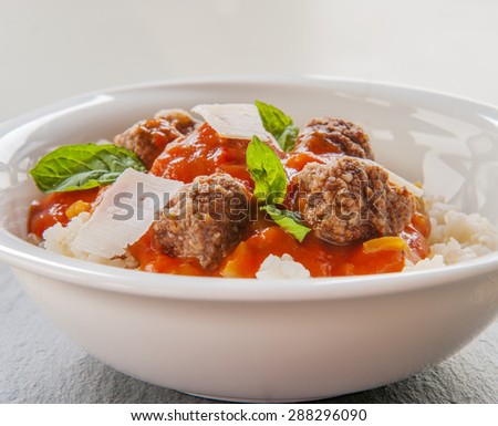 Delicious meatballs made from ground beef in a spicy tomato sauce