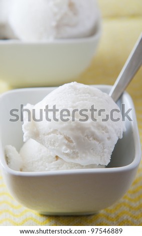scoops of vanilla ice cream in bowl