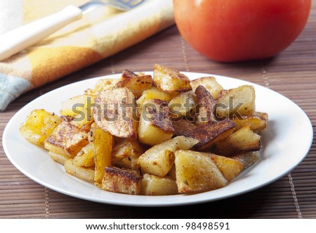 Well spiced roasted potato served as main dish