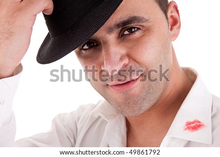 seductive man greeting with his hat, the shirt with lipstick mark