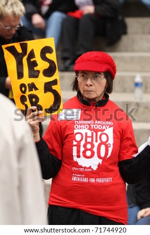 COLUMBUS, OH - FEB 17: Demonstrators protesting at OH Capital for and against Senate Bill 5 which will stop Collective bargaining for Teachers, Nurses and Fire Fighters. Feb 17, 2011 in Columbus, OH.