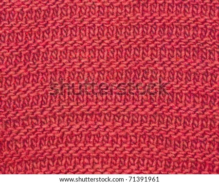Knitted red cloth close up, a background