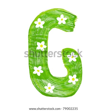 stock photo : The green letters G drawn by paints with white blossom