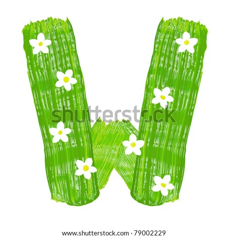 stock photo : The green letters W drawn by paints with white blossom