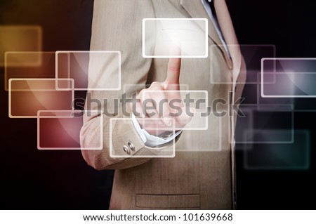 female hand in suit reaching or touching something with fingers over black