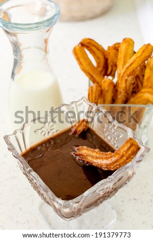 Typical Spanish fried pastry for dessert - churros