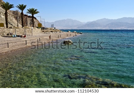 Coral beach and reefs near Eilat - famous resort and recreation city at the Red Sea, Israel