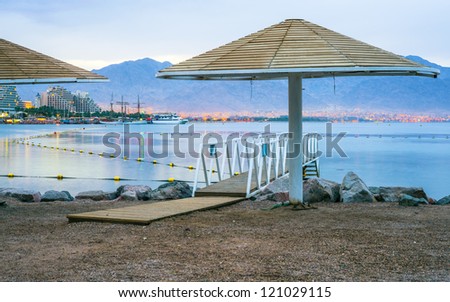 Early morning on the central beach of Eilat - famous resort city on the Red Sea, Israel