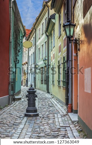 Narrow medieval street in old Riga cit, Latvia. In 2014, Riga is the European capital of culture