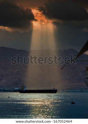 Dramatic sunlight before just before dust storm at the Red Sea