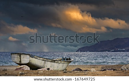 After storm on the stone beach of the Red Sea near Eilat, Israel