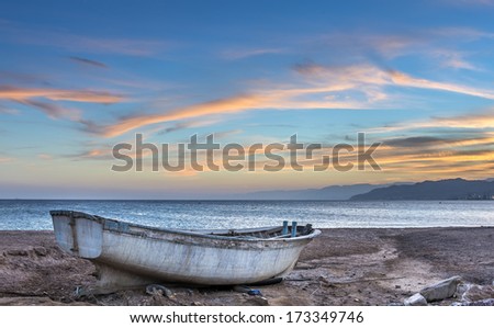 Old fishing boat beached at the Red Sea