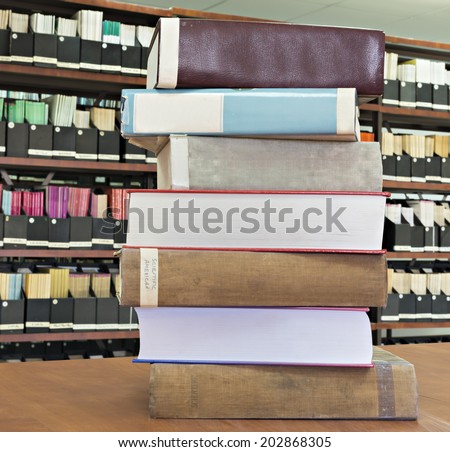 Stack of old books in a library