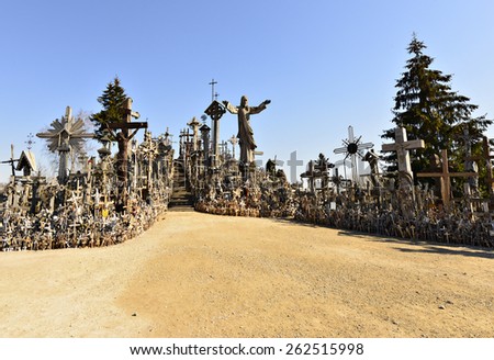 The hill of the Crosses in Lithuania, one of the most important pilgrimage sights of the Baltic. Thousands of different crosses  and tiny effigies have been brought here by Catholic pilgrims.