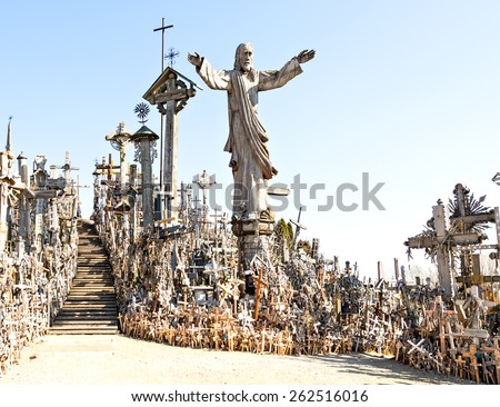The hill of the Crosses in Lithuania, one of the most important pilgrimage sights of the Baltic. Thousands of different crosses  and tiny effigies have been brought here by Catholic pilgrims.