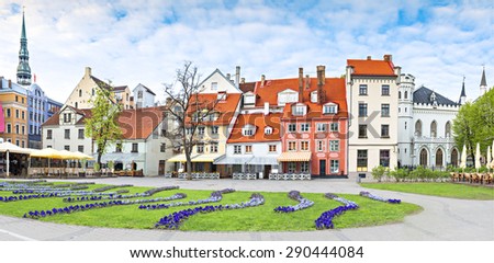 Panoramic view on flowered square in the center of old Riga with numerous coffee shops and restaurants, Latvia