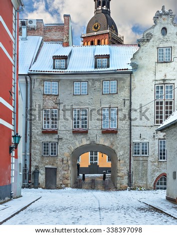 Winter is coming in medieval street of old European city