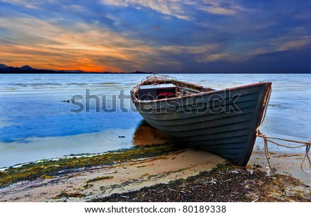 The old fishing boat at sunset