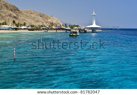 View on coral reef at southern beach of Eilat – famous recreation town on the Red Sea, Israel