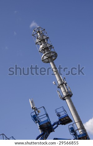 Cherry picker and communications tower