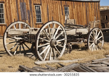 old wooden stage coach in western ghost mining  town