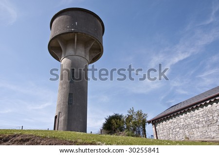 recycle water tower in rural countryside