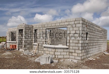 new build concrete stone House Construction blue sky