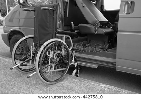 photo black and white wheelchair facilitate van