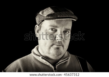 photo portrait black white of overweight male on black