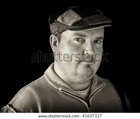 photo portrait black white of overweight male on black