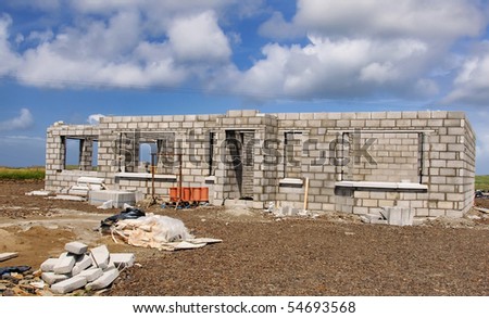 new build concrete stone House Construction blue sky